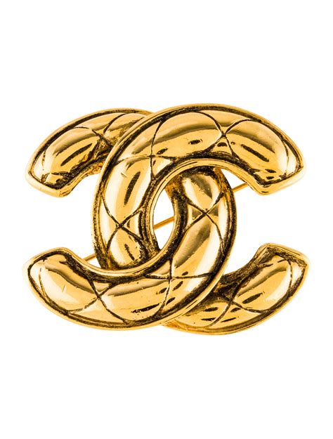 chanel metal quilted cc brooch